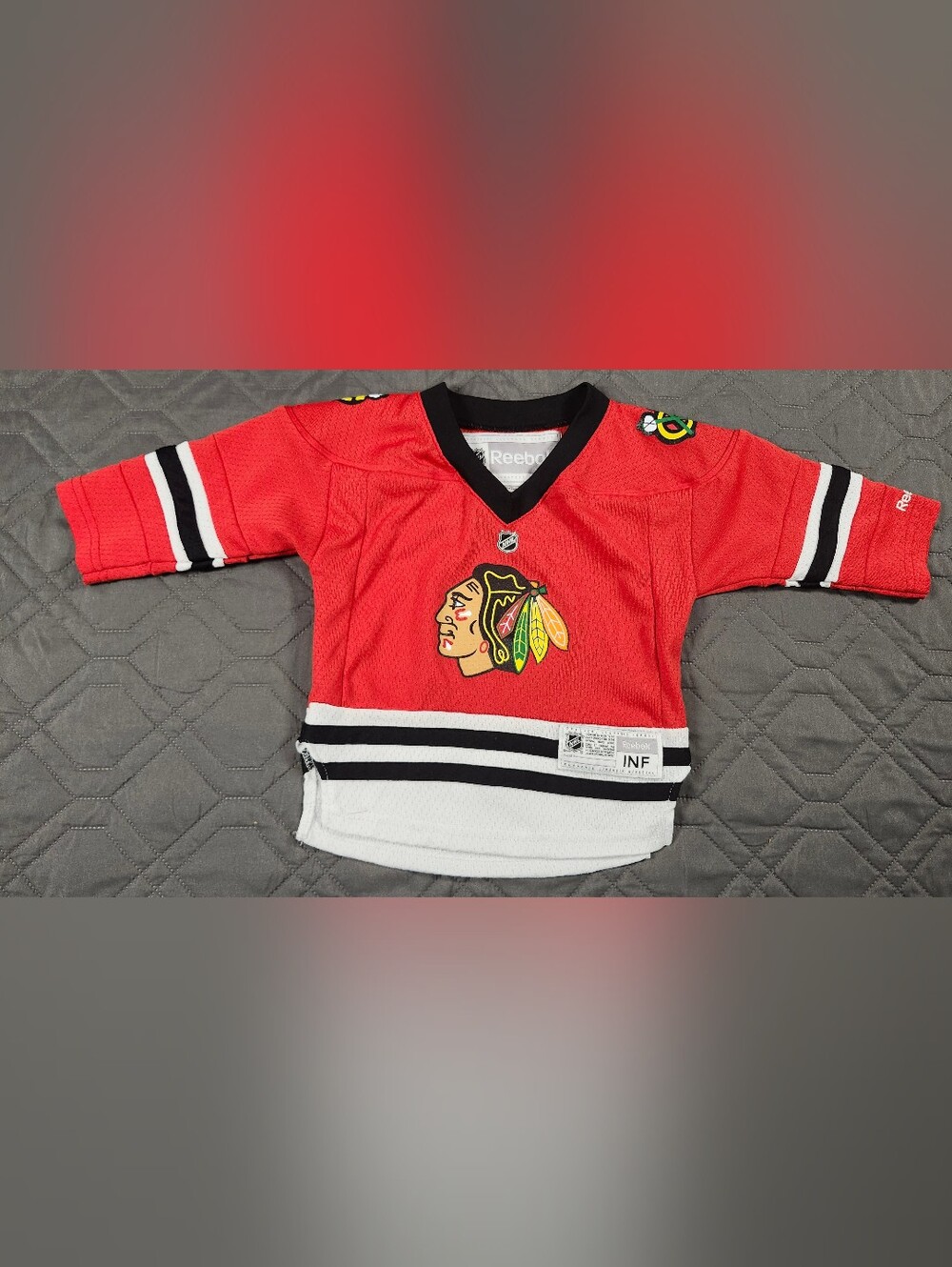 official Reebok NHL Chicago Blackhawks infant red home jersey 12/24 months. Wear